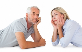 Middle age couple thinking with white background, estate planning attorney