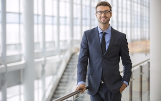 Single man in business suit in office building, estate planning attorney