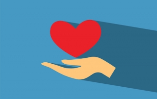 Hand giving heart, blue background, charitable giving tax advice, tax attorney