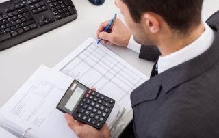 Successful accountant working with financial data in the office